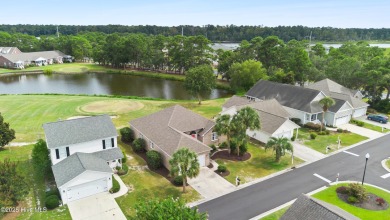 Step inside 7919 Trap Way and you're immediately welcomed into a on Masonboro Country Club in North Carolina - for sale on GolfHomes.com, golf home, golf lot