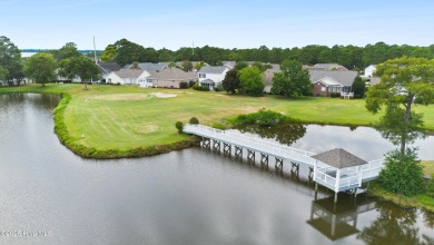 Step inside 7919 Trap Way and you're immediately welcomed into a on Masonboro Country Club in North Carolina - for sale on GolfHomes.com, golf home, golf lot
