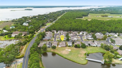 Step inside 7919 Trap Way and you're immediately welcomed into a on Masonboro Country Club in North Carolina - for sale on GolfHomes.com, golf home, golf lot