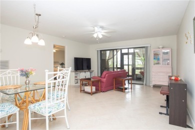 Wonderful first-floor charmer in Pelican Pointe, a river-access on Pelican Pointe 9 Hole Course in Florida - for sale on GolfHomes.com, golf home, golf lot