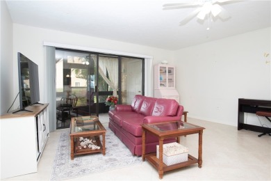 Wonderful first-floor charmer in Pelican Pointe, a river-access on Pelican Pointe 9 Hole Course in Florida - for sale on GolfHomes.com, golf home, golf lot