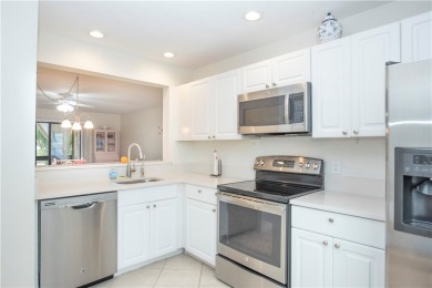 Wonderful first-floor charmer in Pelican Pointe, a river-access on Pelican Pointe 9 Hole Course in Florida - for sale on GolfHomes.com, golf home, golf lot