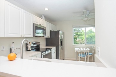 Wonderful first-floor charmer in Pelican Pointe, a river-access on Pelican Pointe 9 Hole Course in Florida - for sale on GolfHomes.com, golf home, golf lot