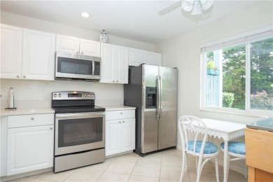 Wonderful first-floor charmer in Pelican Pointe, a river-access on Pelican Pointe 9 Hole Course in Florida - for sale on GolfHomes.com, golf home, golf lot