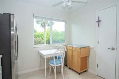Wonderful first-floor charmer in Pelican Pointe, a river-access on Pelican Pointe 9 Hole Course in Florida - for sale on GolfHomes.com, golf home, golf lot