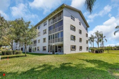 Discover this beautifully upgraded 2nd-floor corner unit in the on Flamingo Lakes Country Club in Florida - for sale on GolfHomes.com, golf home, golf lot