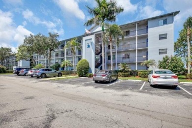 Discover this beautifully upgraded 2nd-floor corner unit in the on Flamingo Lakes Country Club in Florida - for sale on GolfHomes.com, golf home, golf lot