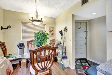 Discover this beautifully upgraded 2nd-floor corner unit in the on Flamingo Lakes Country Club in Florida - for sale on GolfHomes.com, golf home, golf lot