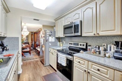 Discover this beautifully upgraded 2nd-floor corner unit in the on Flamingo Lakes Country Club in Florida - for sale on GolfHomes.com, golf home, golf lot