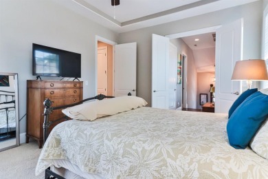 Welcome to 2557 Pete Dye Dr #505, a stunning three-story on Barefoot Resort and Golf Club  in South Carolina - for sale on GolfHomes.com, golf home, golf lot