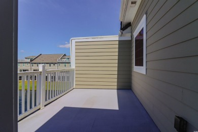 Welcome to 2557 Pete Dye Dr #505, a stunning three-story on Barefoot Resort and Golf Club  in South Carolina - for sale on GolfHomes.com, golf home, golf lot