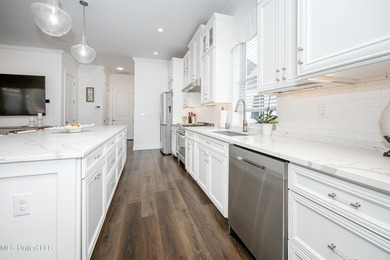 Are you searching for a custom-built home in the highly coveted on Shell Landing Golf Club in Mississippi - for sale on GolfHomes.com, golf home, golf lot