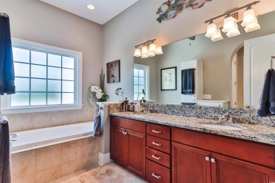 Welcome to 2557 Pete Dye Dr #505, a stunning three-story on Barefoot Resort and Golf Club  in South Carolina - for sale on GolfHomes.com, golf home, golf lot