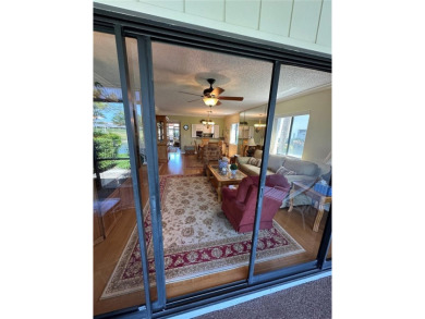 Feel the breeze as you enter this desirable first floor condo in on IMG Academies Golf and Country Club in Florida - for sale on GolfHomes.com, golf home, golf lot