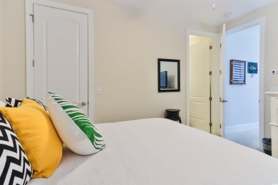 Welcome to 2557 Pete Dye Dr #505, a stunning three-story on Barefoot Resort and Golf Club  in South Carolina - for sale on GolfHomes.com, golf home, golf lot