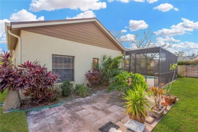Welcome home to your tropical oasis, nestled in the highly on Countryway Golf Course in Florida - for sale on GolfHomes.com, golf home, golf lot
