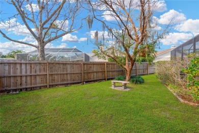 Welcome home to your tropical oasis, nestled in the highly on Countryway Golf Course in Florida - for sale on GolfHomes.com, golf home, golf lot