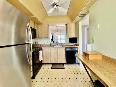 Lovely first-floor 2 bed 2 bath well appointed condo in the on Marina Lakes Golf Course in Florida - for sale on GolfHomes.com, golf home, golf lot