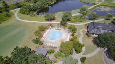 Welcome to 2557 Pete Dye Dr #505, a stunning three-story on Barefoot Resort and Golf Club  in South Carolina - for sale on GolfHomes.com, golf home, golf lot