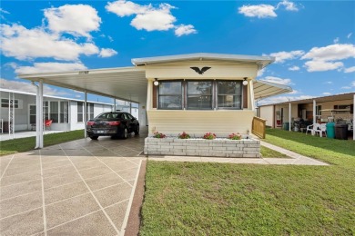 Under contract-accepting backup offers. Escape Winter and on Betmar Acres Golf Club in Florida - for sale on GolfHomes.com, golf home, golf lot