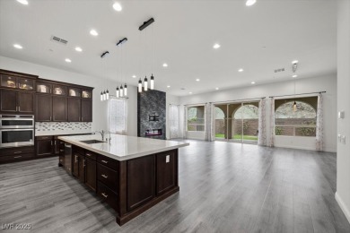 Experience upscale desert living in this stunning single-story on South Shore At Lake Las Vegas in Nevada - for sale on GolfHomes.com, golf home, golf lot