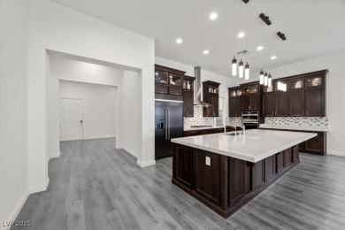 Experience upscale desert living in this stunning single-story on South Shore At Lake Las Vegas in Nevada - for sale on GolfHomes.com, golf home, golf lot