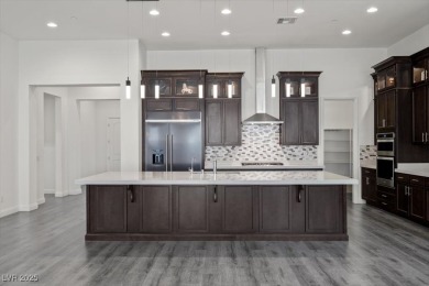 Experience upscale desert living in this stunning single-story on South Shore At Lake Las Vegas in Nevada - for sale on GolfHomes.com, golf home, golf lot