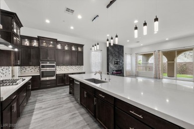Experience upscale desert living in this stunning single-story on South Shore At Lake Las Vegas in Nevada - for sale on GolfHomes.com, golf home, golf lot
