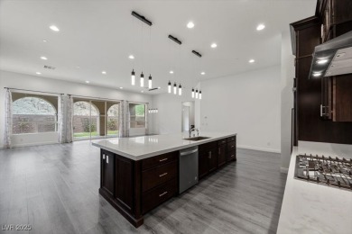 Experience upscale desert living in this stunning single-story on South Shore At Lake Las Vegas in Nevada - for sale on GolfHomes.com, golf home, golf lot