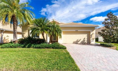 MOTIVATED SELLER! BEAUTIFUL WATERFRONT LAKE VIEW! No CDD fees on Heron Creek Golf and Country Club in Florida - for sale on GolfHomes.com, golf home, golf lot