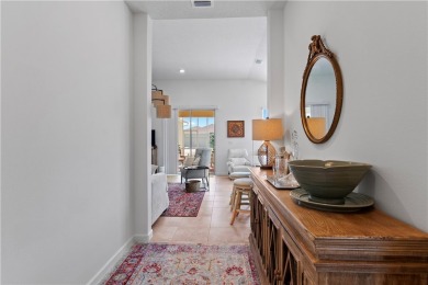 As you walk into this home, you are greeted in a beautiful foyer on The Club At Pointe West in Florida - for sale on GolfHomes.com, golf home, golf lot