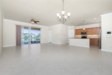 MOTIVATED SELLER! BEAUTIFUL WATERFRONT LAKE VIEW! No CDD fees on Heron Creek Golf and Country Club in Florida - for sale on GolfHomes.com, golf home, golf lot