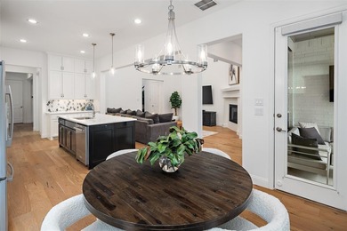 Experience elevated living with picturesque lake views from on The Tribute At the Colony in Texas - for sale on GolfHomes.com, golf home, golf lot