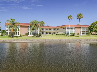 First Floor 1BDR/1BA condo with lake views in active 55+ on The American Golf Club in Florida - for sale on GolfHomes.com, golf home, golf lot