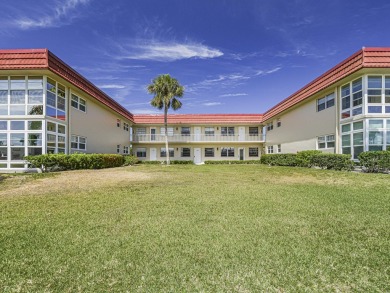 First Floor 1BDR/1BA condo with lake views in active 55+ on The American Golf Club in Florida - for sale on GolfHomes.com, golf home, golf lot