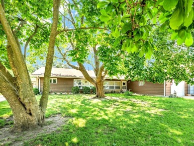 This tri-level home is ideally situated on Hole No. 1 of Willow on Willow Pond Golf Course in Illinois - for sale on GolfHomes.com, golf home, golf lot