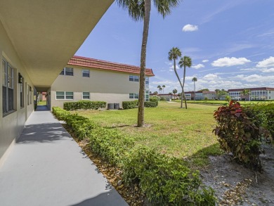 First Floor 1BDR/1BA condo with lake views in active 55+ on The American Golf Club in Florida - for sale on GolfHomes.com, golf home, golf lot