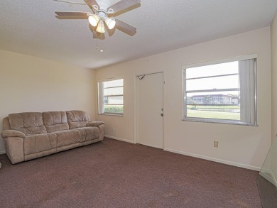 First Floor 1BDR/1BA condo with lake views in active 55+ on The American Golf Club in Florida - for sale on GolfHomes.com, golf home, golf lot