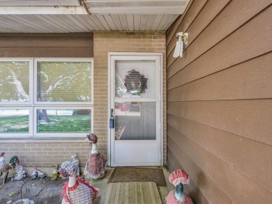 This tri-level home is ideally situated on Hole No. 1 of Willow on Willow Pond Golf Course in Illinois - for sale on GolfHomes.com, golf home, golf lot