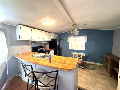 You don't want to miss this great deal on a 2-bedroom/1-bath on Lake Henry Golf Club in Florida - for sale on GolfHomes.com, golf home, golf lot