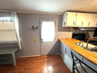 You don't want to miss this great deal on a 2-bedroom/1-bath on Lake Henry Golf Club in Florida - for sale on GolfHomes.com, golf home, golf lot