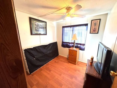 You don't want to miss this great deal on a 2-bedroom/1-bath on Lake Henry Golf Club in Florida - for sale on GolfHomes.com, golf home, golf lot