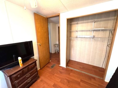 You don't want to miss this great deal on a 2-bedroom/1-bath on Lake Henry Golf Club in Florida - for sale on GolfHomes.com, golf home, golf lot