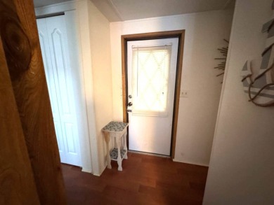 You don't want to miss this great deal on a 2-bedroom/1-bath on Lake Henry Golf Club in Florida - for sale on GolfHomes.com, golf home, golf lot
