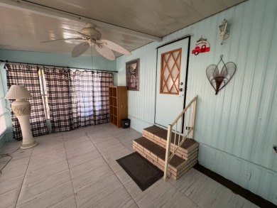 You don't want to miss this great deal on a 2-bedroom/1-bath on Lake Henry Golf Club in Florida - for sale on GolfHomes.com, golf home, golf lot