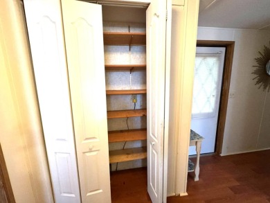You don't want to miss this great deal on a 2-bedroom/1-bath on Lake Henry Golf Club in Florida - for sale on GolfHomes.com, golf home, golf lot