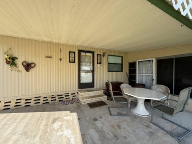You don't want to miss this great deal on a 2-bedroom/1-bath on Lake Henry Golf Club in Florida - for sale on GolfHomes.com, golf home, golf lot
