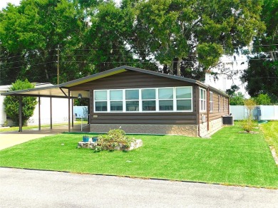 HEY, when I retire I want to live in a log cabin with a on Betmar Acres Golf Club in Florida - for sale on GolfHomes.com, golf home, golf lot