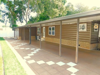 HEY, when I retire I want to live in a log cabin with a on Betmar Acres Golf Club in Florida - for sale on GolfHomes.com, golf home, golf lot