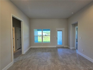 Live Where Others Vacation - Experience peaceful golf course on Twisted Oaks Golf Club in Florida - for sale on GolfHomes.com, golf home, golf lot